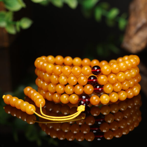 amber buddhist prayer beads.jpg